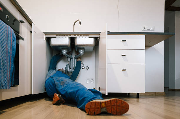 Professional Plumbing technician working in Walton, IN